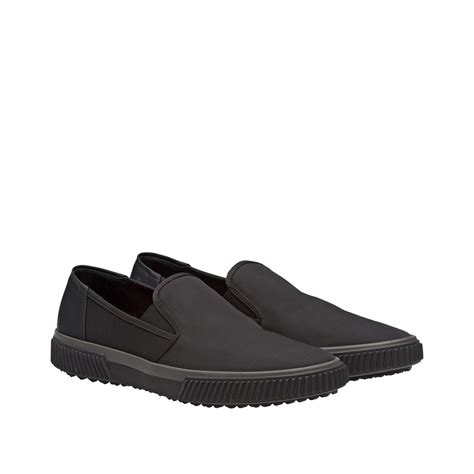 prada rubber slip ons